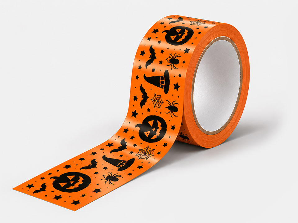 Orangefarbene Rolle Halloween-Klebeband mit K&uuml;rbissen, Hexenh&uuml;ten, Fledermaeusen und Spinnen